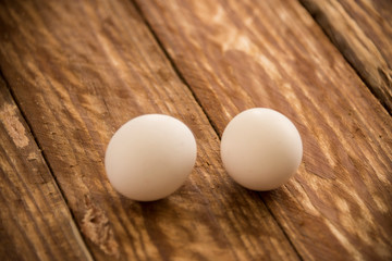 Fresh delicious fruit eggs for a good meal..Wood background.