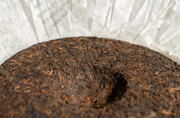 Fototapeta premium Puer or pu-erh - Pressed fermented tea produced in the Yunnan province of China