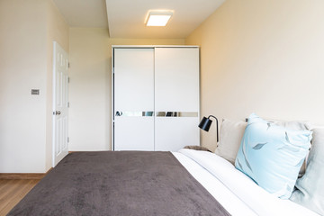 view of a bedroom  on walls with on bed