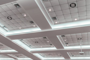 Ceiling gypsum in meeting room dark of business interior office building and light neon