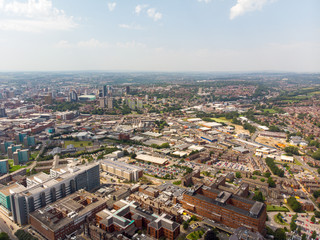 Fototapeta na wymiar Aerial photo of the St. James's University Hospital in Leeds, West Yorkshire, England, showing the Hospital, A&E entrance and grounds and also the Leeds City Centre in the background on a sunny day.