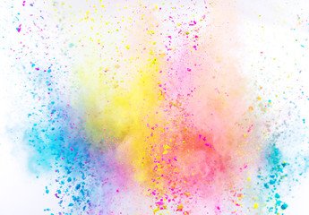 Colored powder explosion on white background.