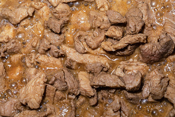 delicious appetizing dish of goulash in sour cream sauce background culinary. set pork meat dish...