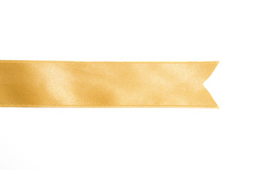 Gold ribbon in roll on white - 282047775