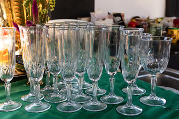 table stand many glasses preparing for the holiday set of wine glasses elongated transparent