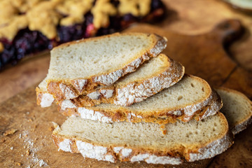 Slices of bread on a wooden board.