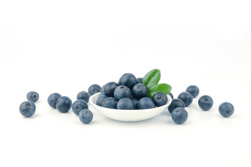 blueberry fruit on white plate