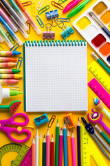 School notebook and various stationery. Education concept.