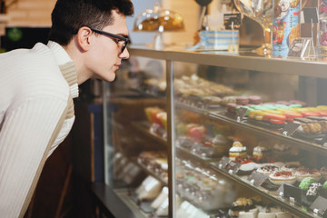 Young guy in a cafe.