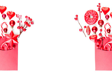Christmas banner background holly berries, star and decorations in red envelope isolated on white....