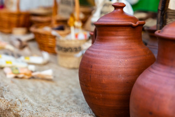 pair brown earthen jug milk storage in the background of the village fair copy space