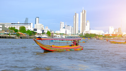 Fototapeta premium Passenger boats on the Chao Phraya River, long tail boat thailand.