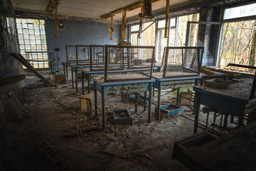 Fototapeta na wymiar Abandoned Classroom in evacuated school