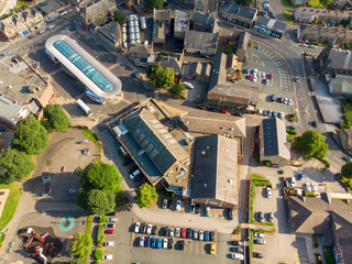 Aerial photo of the Leeds town of Pudsey in West Yorkshire, England showing typical British streets and business taken on a sunny bright summers day.