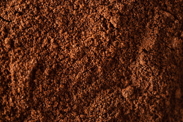 Ground coffee texture background, close up