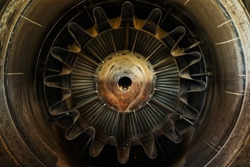 Rusty old jet engine closeup as background