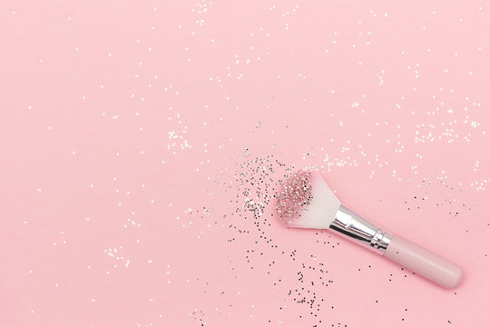 Makeup brush and shiny sparkles on pastel pink background. Festive magic  makeup concept. Template for design, Top view Flat Lay Copy space Photos |  Adobe Stock