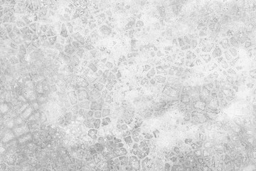 Grunge concrete wall at covered with gray cement old surface with crack in industrial building, great for your design and texture background. Black and white cracked floor texture vintage.