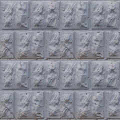Seamless soft focus texture of decorative concrete wall from bricks.