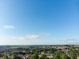 Aerial photo of the Leeds town of Pudsey in West Yorkshire, England showing typical British streets and business taken on a sunny bright summers day.