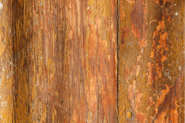 background of weathered and faded brown wooden wall with cracks and scratches. fragment of old grimy striped wood pavement. - obrazy, fototapety, plakaty