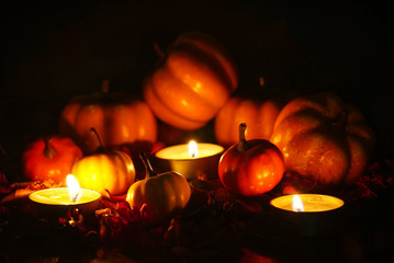 Pumpkin decorate with candles for halloween night party.