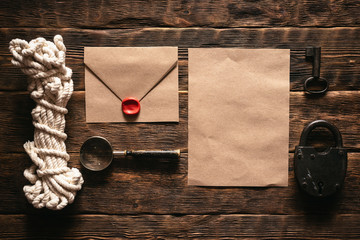 Top secret document paper page template on a wooden table of secret service agent flat lay...