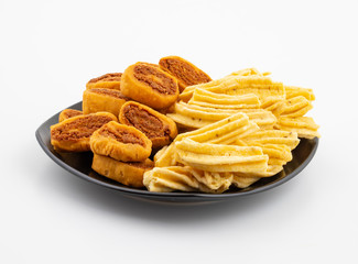 Indian Traditional Spicy Snack Ghatiya With Bhakarwadi Also Know as Ganthiya, Papdi, Gathiya, Bakarwadi, Bakarvadi, Bakar Vadi or Bakar Wadi Are Deep Fried Snack Made From Chickpea Flour.