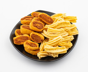 Indian Traditional Spicy Snack Ghatiya With Bhakarwadi Also Know as Ganthiya, Papdi, Gathiya, Bakarwadi, Bakarvadi, Bakar Vadi or Bakar Wadi Are Deep Fried Snack Made From Chickpea Flour.