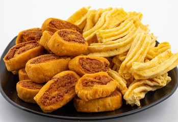 Indian Traditional Spicy Snack Ghatiya With Bhakarwadi Also Know as Ganthiya, Papdi, Gathiya, Bakarwadi, Bakarvadi, Bakar Vadi or Bakar Wadi Are Deep Fried Snack Made From Chickpea Flour.