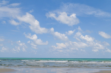 Sea with could and blue sky
