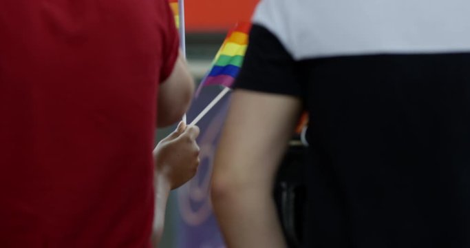 People Wave Colourful Rainbow Flags In Classic British City celebrating Gay Rights At Pride Parade In Nottingham