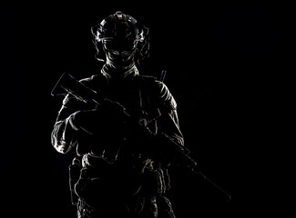 Fototapeta na wymiar Army special forces soldier low key studio shoot