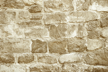 Beige stone mosaic wall background