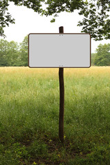 Blank isolated white large clipping nature sign, road sign in park on wooden post