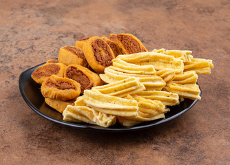 Indian Traditional Spicy Snack Ghatiya With Bhakarwadi Also Know as Ganthiya, Papdi, Gathiya, Bakarwadi, Bakarvadi, Bakar Vadi or Bakar Wadi Are Deep Fried Snack Made From Chickpea Flour.