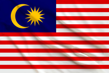 national flag of Malaysia on a silk cloth with folds from the wind, a symbol of tourism, immigration, politic