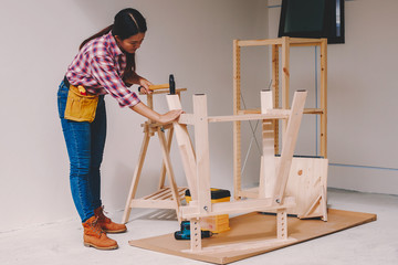 woman worker in the carpenter workroom.