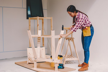 woman worker in the carpenter workroom.