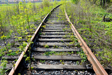 Old rusty rails of an abandoned railway.