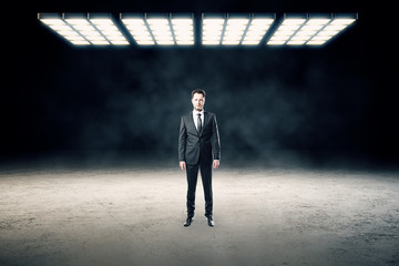 Obraz premium Businessman in abstract interior