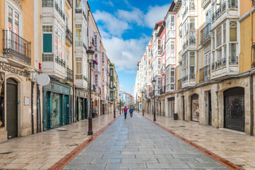 streets of burgos city and cathedral at background - obrazy, fototapety, plakaty