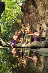 Beautiful Thai girl in traditional dress costume in Kinnaree A fairy tale animal with a human body, but the tail is a bird, Thai Woman in Traditional Costume of Thailand.