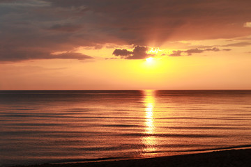 Epic golden sunset over the Baltic sea