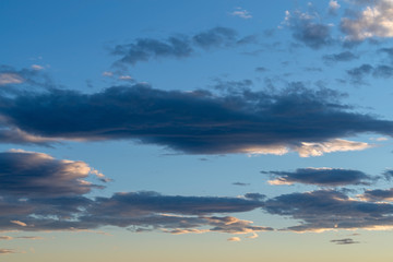 Obraz na płótnie Canvas Stratocumulus stratiformis clouds at evening twilight