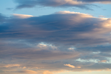 Naklejka na ściany i meble Stratocumulus stratiformis clouds at evening twilight