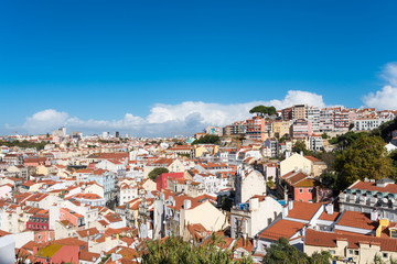 The hill and viewpoint, Miradouro da Senhora do Monte, on the right side in the Graça district of Lisbon