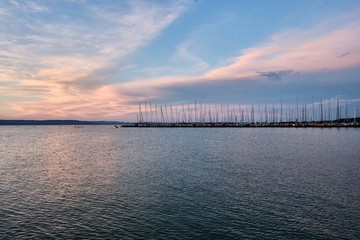 Fototapeta na wymiar marina and sailboats at lake Balaton at sunset, Plattensee, Hungary