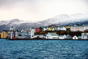 Aerial view of Alesund, Norway during the winter. Cloudy sky