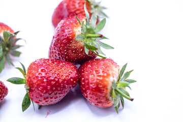 Close up fresh strawberry isolate on white background.Blurred background of fresh strawberry.